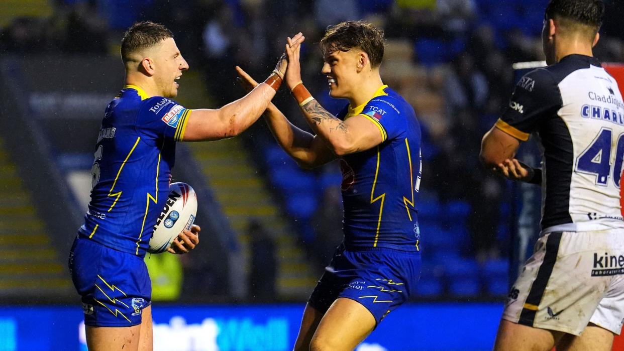 George Williams celebrates scoring a try