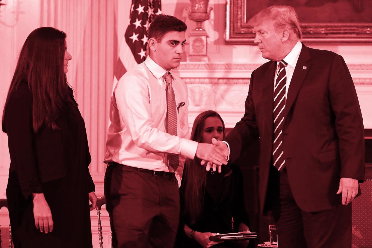 Donald Trump greets Marjory Stoneman Douglas High School shooting survivor Jonathan Blank and his mother Melissa Blank before hosting a listening session school shooting survivors, their parents, teachers and others: Chip Somodevilla/Getty Images
