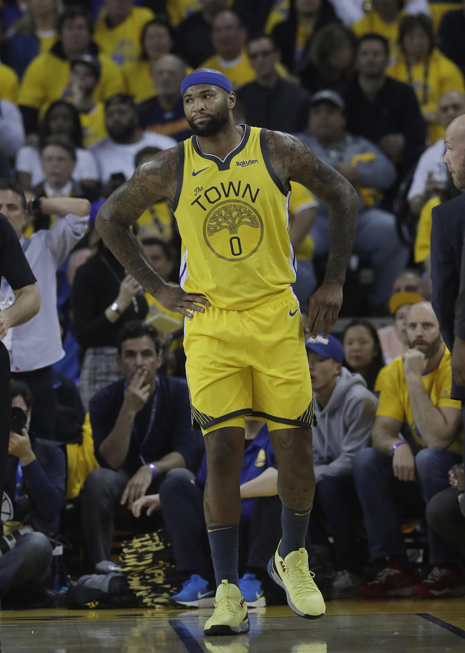 Golden State Warriors center DeMarcus Cousins reacts after injuring his leg during the first half of Game 2 of a first-round NBA basketball playoff series against the Los Angeles Clippers in Oakland, Calif., Monday, April 15, 2019. (AP Photo/Jeff Chiu)