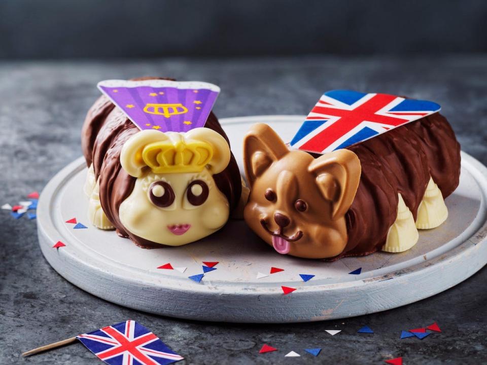 One Queen's Jubilee-themed caterpillar cake and one corgi cake pictured