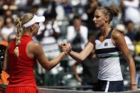 Mar 30, 2017; Miami, FL, USA; Caroline Wozniacki of Denmark (L) shakes hands with Karoilina Pliskova of the Czech Republic (R) after their match in a women's singles semi-final during the 2017 Miami Open at Crandon Park Tennis Center. Wozniacki won 5-7, 6-1, 6-1. Geoff Burke-USA TODAY Sports