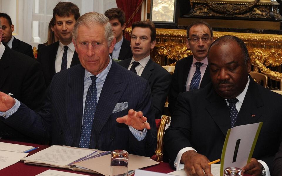 The Prince of Wales and Ali Bongo, President of Gabon, during a meeting of international leaders to discuss curbing world deforestation in November 2012 - PA