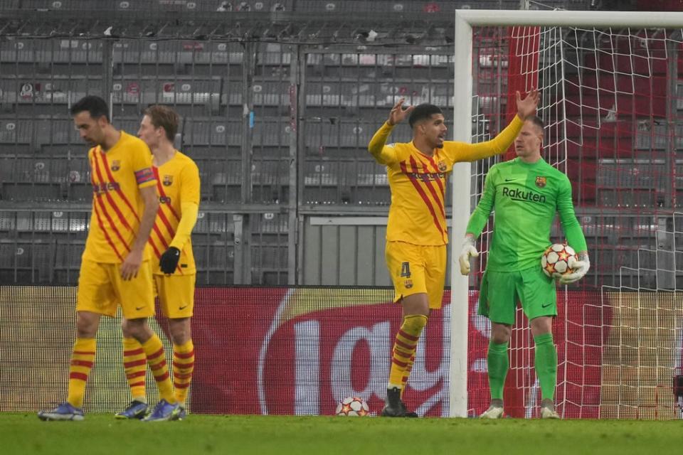 Barcelona heads are bowed after a 3-0 defeat to Bayern Munich confirmed their Champions League exit (Matthias Schrader/AP) (AP)