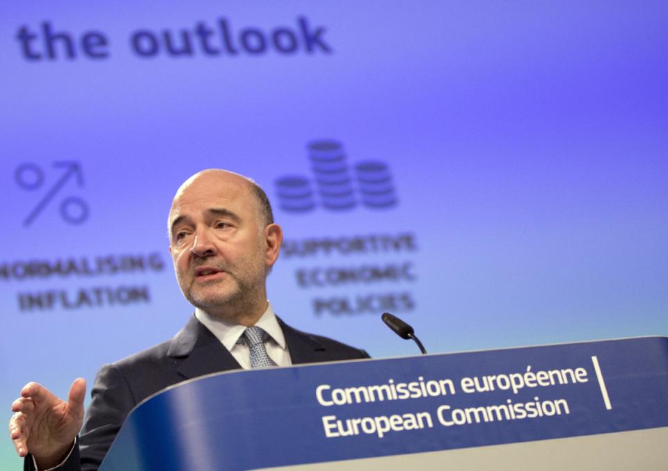 European Commissioner for Economic and Financial Affairs Pierre Moscovici speaks during a presentation of the winter economic forecast at EU headquarters in Brussels on Monday, Feb. 13, 2017. (AP Photo/Virginia Mayo)