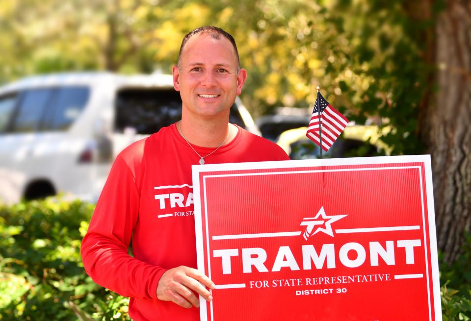 Florida House District 30 candidate Chase Tramont won Tuesday's primary. He is pictured campaigning Saturday during early voting at  Titusville Public Library.