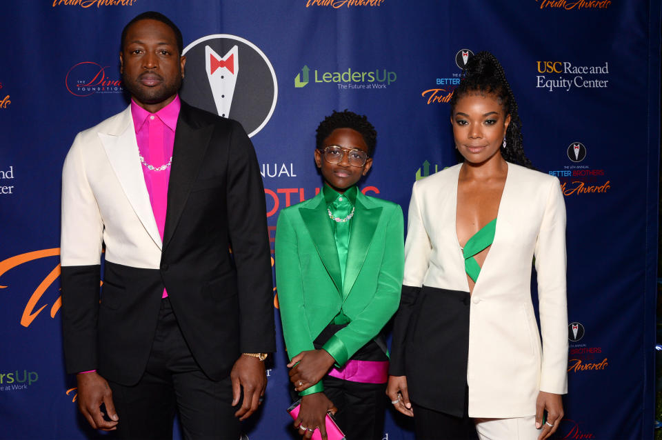 Dwyane Wade, from left, with Zaya Wade and Gabrielle Union, pictured in 2020. Both parents have been outspoken supporters of their transgender daughter. (Photo: Andrew Toth/Getty Images)