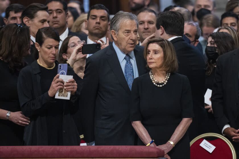 Nancy Pelosi and her husband Paul Pelosi attend a Holy Mass at St. Peter's Basilica in June.