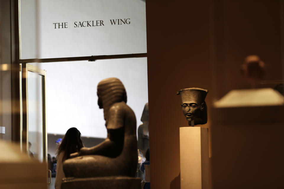 A sign with the Sackler name is displayed at the Metropolitan Museum of Art in New York, Thursday, Jan. 17, 2019. The Sackler name adorns walls at some of the world's top museums and universities, including the Met, the Guggenheim and Harvard. But the family's ties to the powerful painkiller OxyContin and the drug's role in the nation's deadly opioid crisis are bringing a new kind of attention to the Sacklers and their philanthropic legacy. (AP Photo/Seth Wenig)