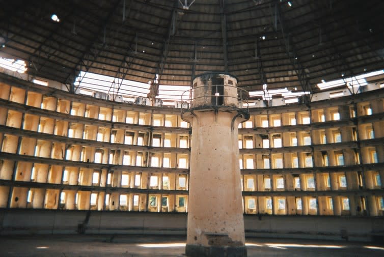 <span class="caption">The Presidio Modelo prison, a panopticon design, in Isla de la Juventud, Cuba.</span> <span class="attribution"><a class="link " href="https://en.wikipedia.org/wiki/Panopticon#/media/File:Presidio-modelo2.JPG" rel="nofollow noopener" target="_blank" data-ylk="slk:Friman/Wikipedia;elm:context_link;itc:0;sec:content-canvas">Friman/Wikipedia</a>, <a class="link " href="http://creativecommons.org/licenses/by-sa/4.0/" rel="nofollow noopener" target="_blank" data-ylk="slk:CC BY-SA;elm:context_link;itc:0;sec:content-canvas">CC BY-SA</a></span>