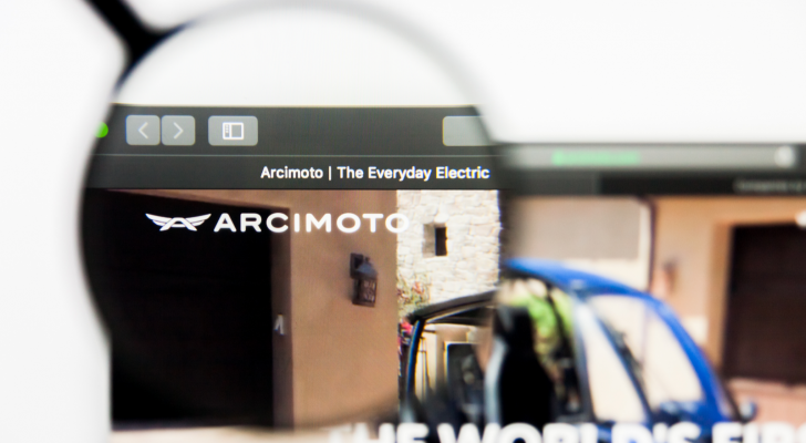 A magnifying glass zooms in on the logo for Arcimoto, Inc. (FUV)