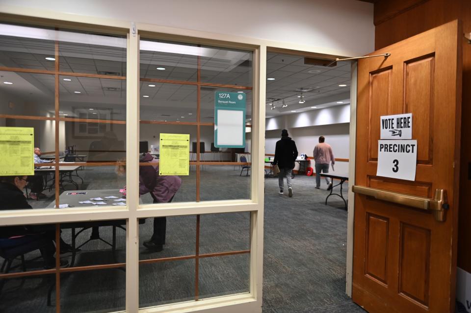 Voters cast their ballots at the Hannah Community Center on Tuesday, Nov. 7, 2023, in East Lansing.