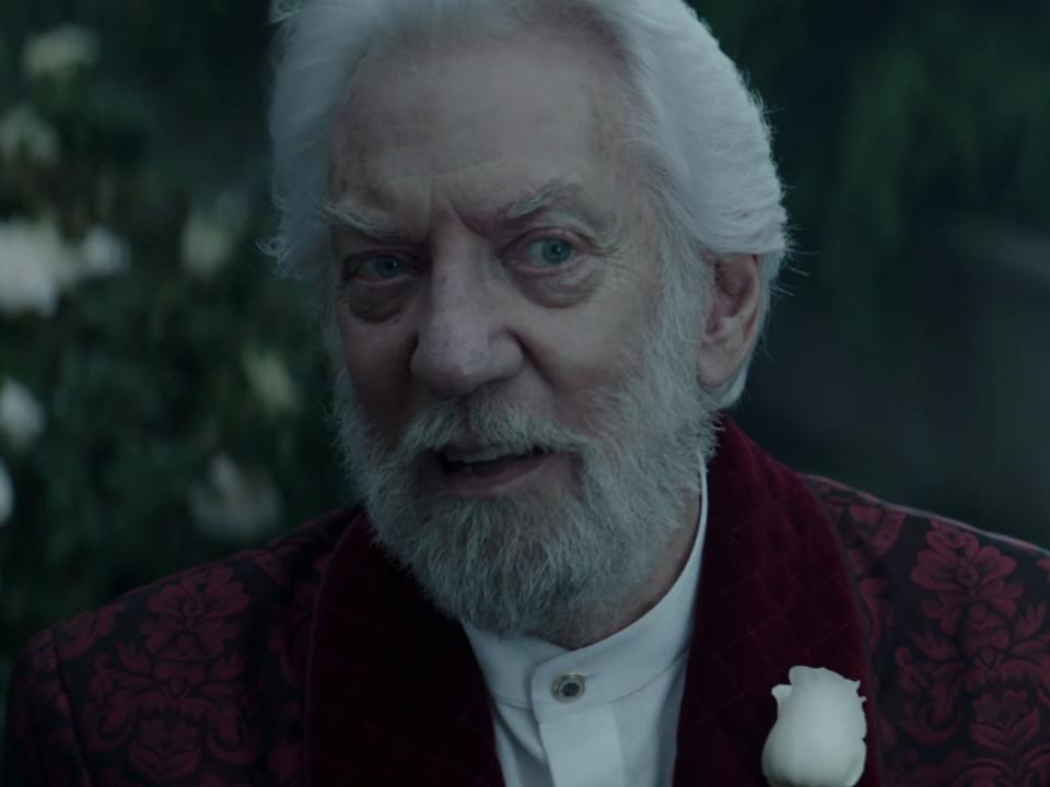 president snow standing in a rose garden in hunger games mockingjay part 2