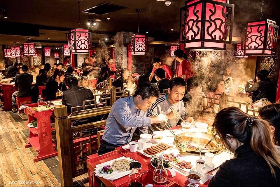 Many patrons are eating inside the Da Long Yi restaurant in Sydney's Chinatown.