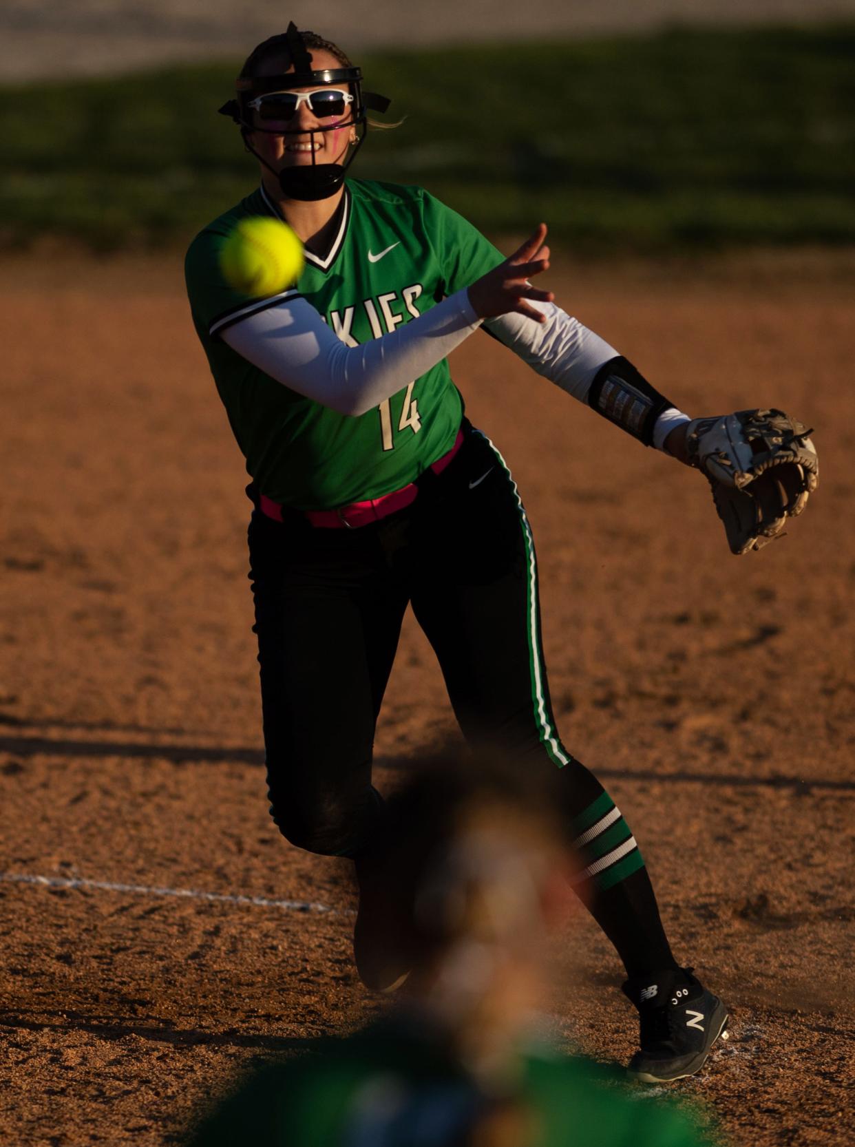 North's Hannah Wilke throws to first base to get the Boonville batter out at Mike Wilson Field Tuesday evening, March 28, 2023.