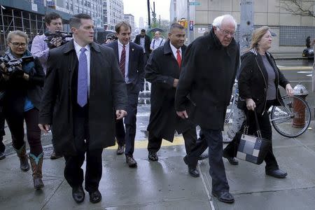 U.S. Democratic presidential candidate and U.S. Senator Bernie Sanders and his wife Jane walk to Van Dam Diner in Queens, New York April 9, 2016. REUTERS/Brian Snyder
