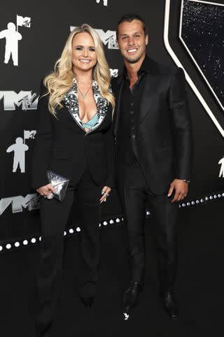 <p>Kevin Mazur/Getty </p> Miranda Lambert and Brendan McLoughlin