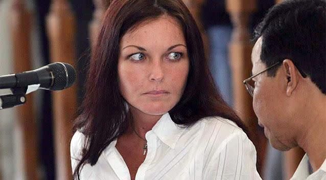 Corby speaks to her lawyer during her trial. Photo: AAP