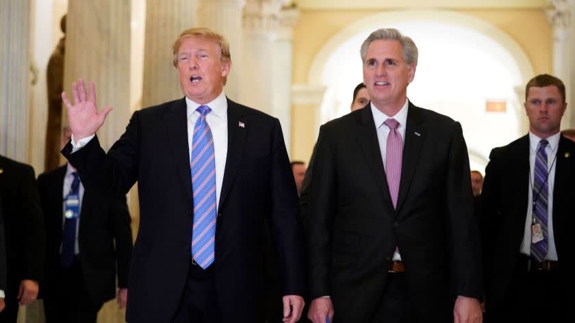 US President Donald Trump (L) walks next to US House Majority Leader Kevin McCarthy (R-CA) after a meeting at the US Capitol with the House Republican Conference in Washington, DC on June 19, 2018. / AFP PHOTO / Mandel NganMANDEL NGAN/AFP/Getty Images ** OUTS - ELSENT, FPG, CM - OUTS * NM, PH, VA if sourced by CT, LA or MoD **