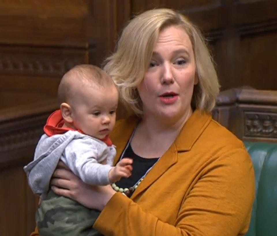 Labour MP Stella Creasy holds her baby daughter in the House of Commons in London as she contributes to a debate on abortion regulation in Northern Ireland while cradling her baby daughter in her arms. (Photo by House of Commons/PA Images via Getty Images)