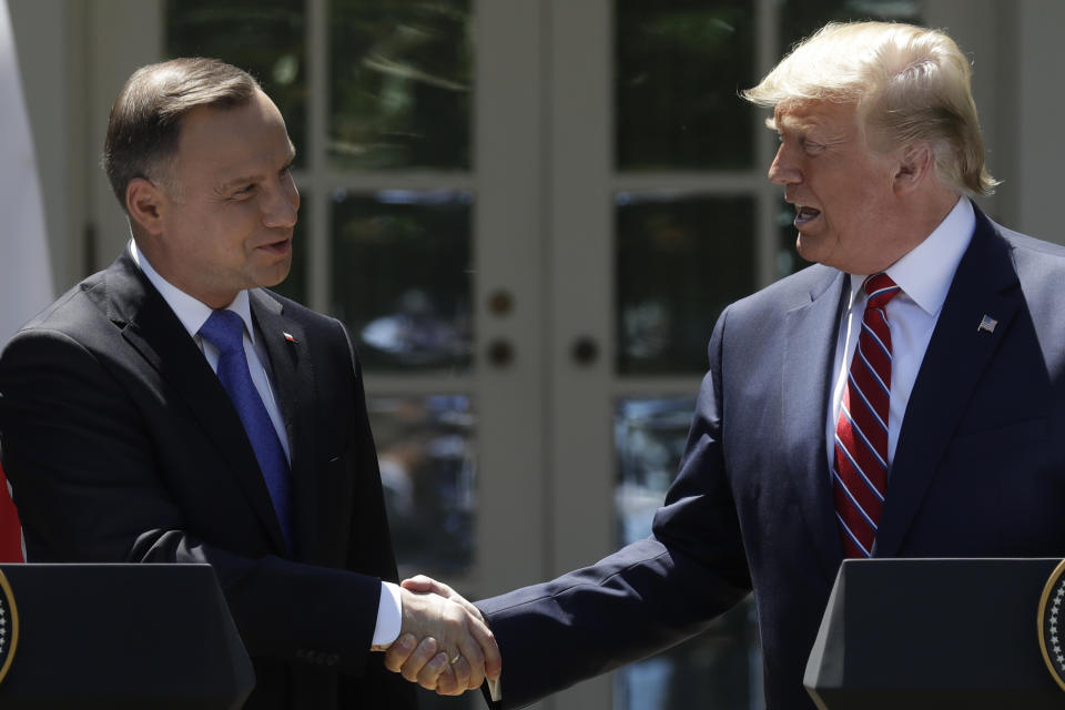 President Donald Trump shakes hands with Polish President Andrzej Duda during a news conference in the Rose Garden of the White House, Wednesday, June 12, 2019, in Washington. (AP Photo/Evan Vucci)