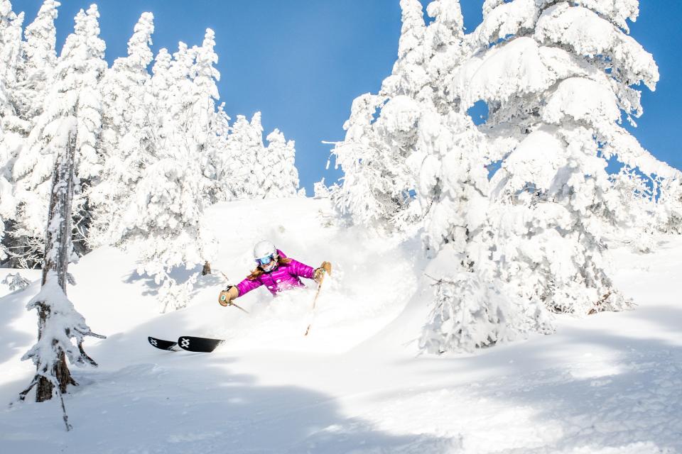 Skiing powder at Stowe Mountain Resort.