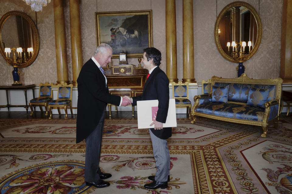 King Charles III receives the Ambassador of Turkey Koray Ertas, as he presents his credentials during a private audience at Buckingham Palace, London, Thursday March 24, 2023. (Victoria Jones/PA via AP)