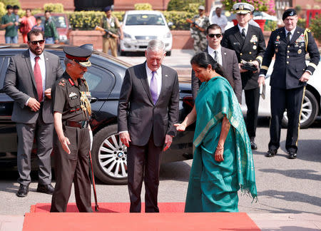 India's Defence Minister Nirmala Sitharaman receives U.S. Defense Secretary Jim Mattis before their meeting in New Delhi, India September 26, 2017. REUTERS/Adnan Abidi