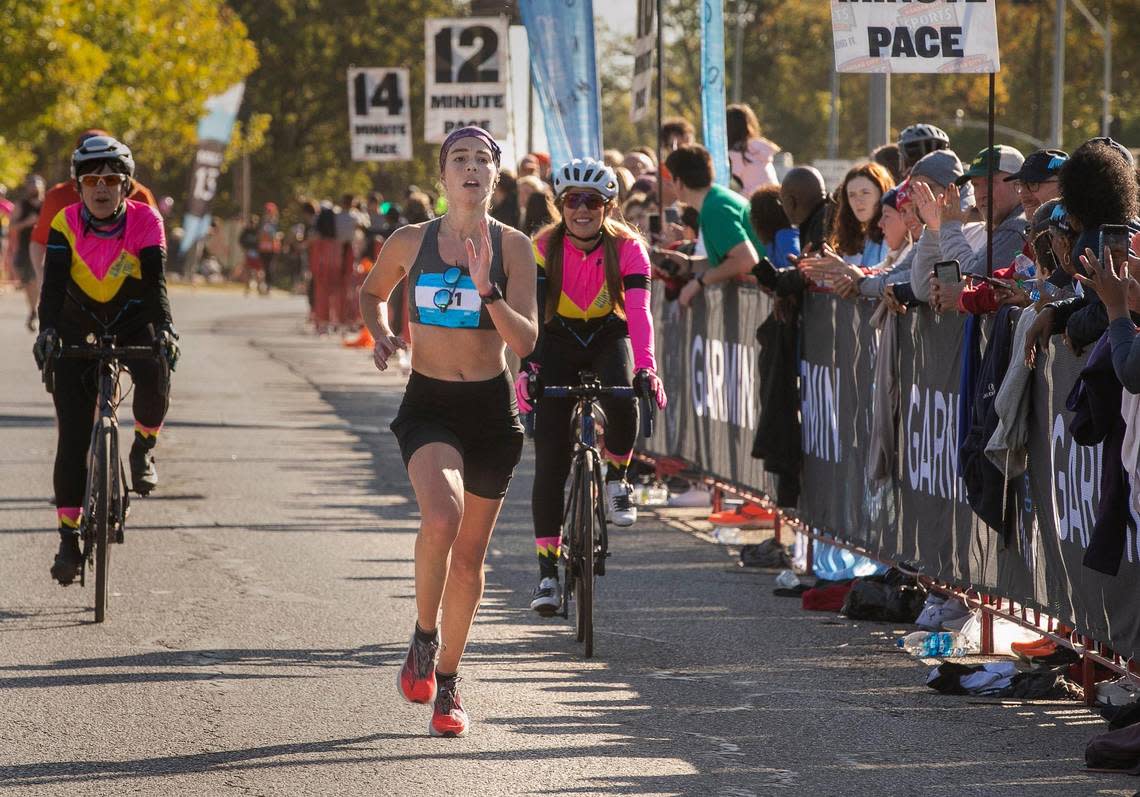 Kaitlyn Shea of Kansas City, the women’s winner of the Garmin Kansas City Marathon, headed for the finish line Saturday, October 15, 2022.
