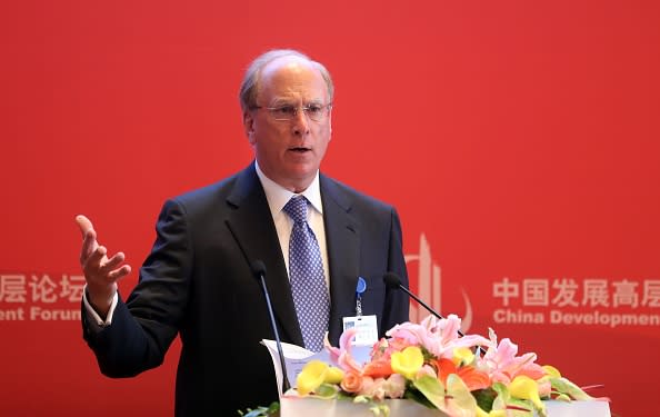 Larry Fink, CEO of BlackRock, calls for more transparency on private company executives pay. (Getty Images)