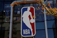 NBA logo is seen on the facade of its flagship store at the Wangfujing shopping street in Beijing