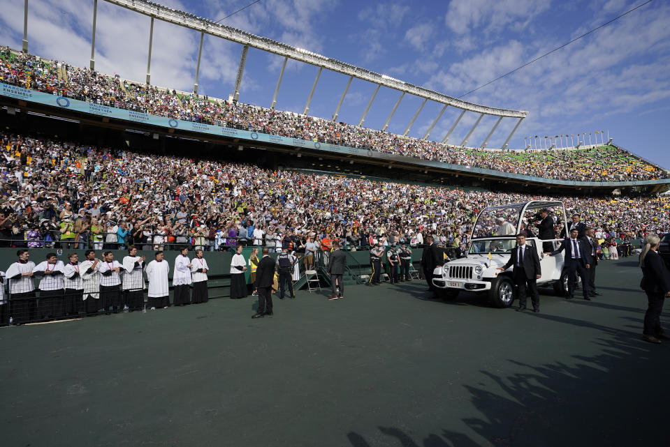 Pope Francis arrives to deliver an open air Mass at Commonwealth Stadium, Tuesday, July 26, 2022, in Edmonton, Alberta. Pope Francis traveled to Canada to apologize to Indigenous peoples for the abuses committed by Catholic missionaries in the country's notorious residential schools. (AP Photo/Eric Gay)