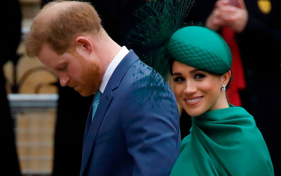 Mrs Mulroney's twins Brian and John and daughter Ivy were attendants when the Sussexes married in 2018 - Tolga Akmen/AFP via Getty Images