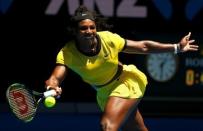 Serena Williams of the U.S. stretches to hit a shot during her second round match against Taiwan's Hsieh Su-wei at the Australian Open tennis tournament at Melbourne Park, Australia, January 20, 2016. REUTERS/Thomas Peter