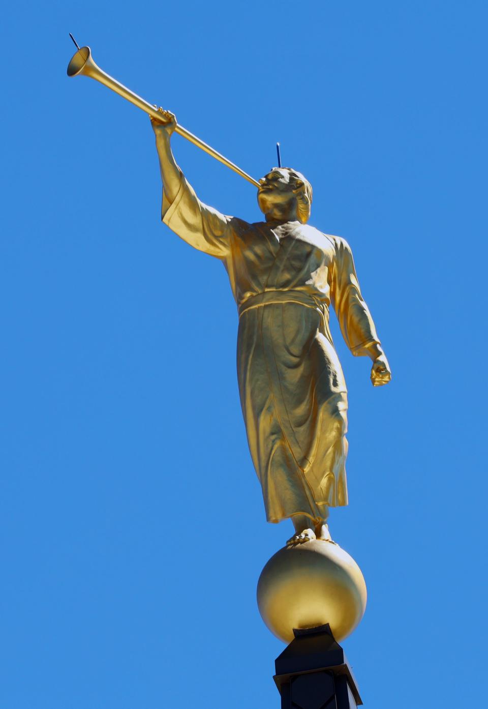 The statue of the Book of Mormon prophet Moroni stands atop the temple at the dedication of the Saratoga Springs Utah Temple in Saratoga Springs, Utah, on Sunday, Aug. 13, 2023. | Scott G Winterton, Deseret News