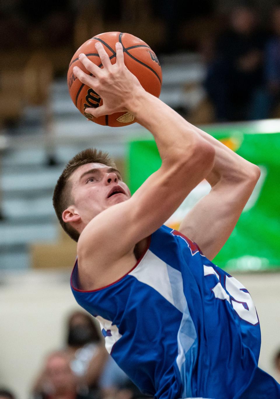 Junior All-Star Mason Jones (35) attempts a lay-up on Wednesday, June 8, 2022, at Mt. Vernon High School in Fortville.