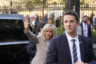 Brigitte Macron, wife of French President Emmanuel Macron, waves to crowds as they arrive at Jackson Square in New Orleans, Friday, Dec. 2, 2022. (AP Photo/Gerald Herbert)