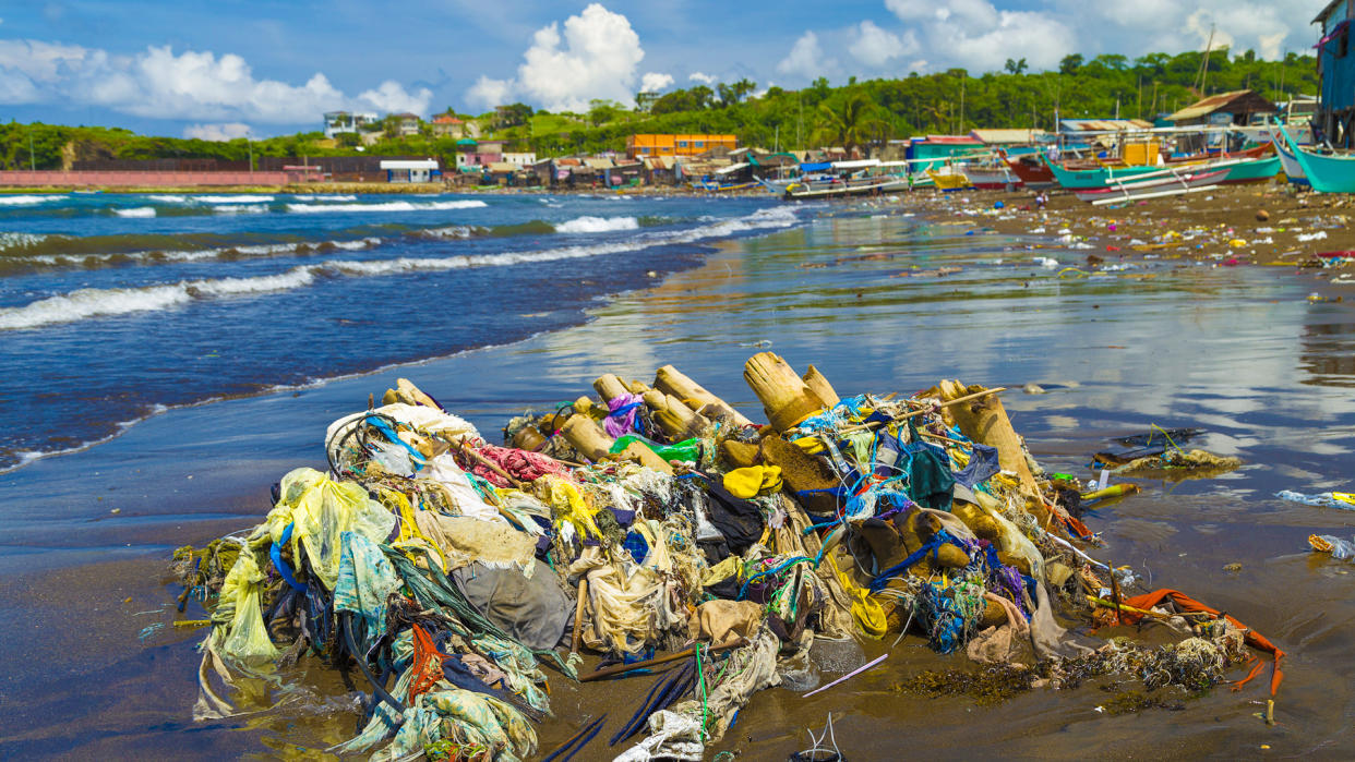 Ocean sea plastic pollution in Manila Bay shore - Image.