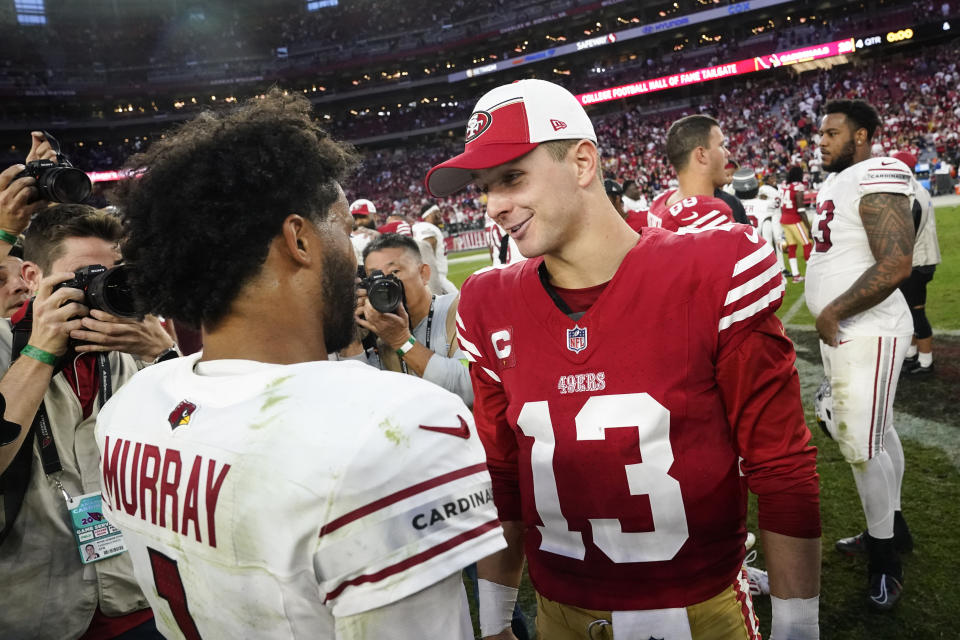 Arizona Cardinals quarterback Kyler Murray, left, greets San Francisco 49ers quarterback Brock Purdy (13) after an NFL football game Sunday, Dec. 17, 2023, in Glendale, Ariz. (AP Photo/Ross D. Franklin)