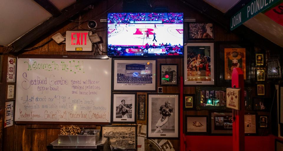 A television surronded by Indiana sports memorabilia at Nick's English Hut during the Indiana University versus Rutgers men's basketball game on Tuesday, Jan. 10, 2024.