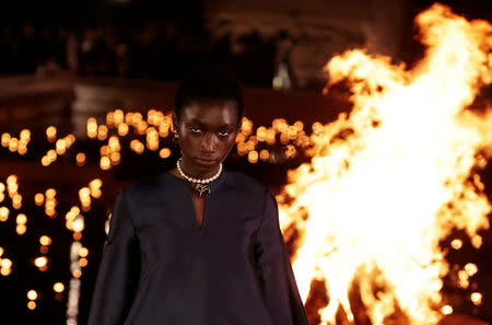 A model presents a creation during the Cruise 2020 collection show for French fashion house Dior in Marrakech, Morocco, April 29, 2019. REUTERS/Youssef Boudlal