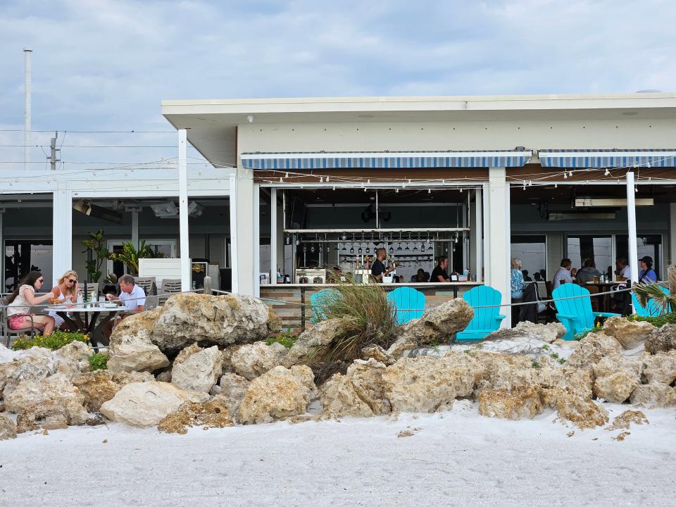 Beach House Waterfront Restaurant is at 200 Gulf Drive N., Bradenton Beach on Anna Maria Island. Its outdoor bar, photographed April 10, 2024, overlooks the sand and Gulf of Mexico.