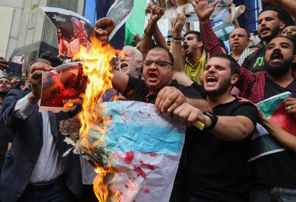 Egyptians in Cairo shout slogans against Israel and the U.S. on Wednesday.