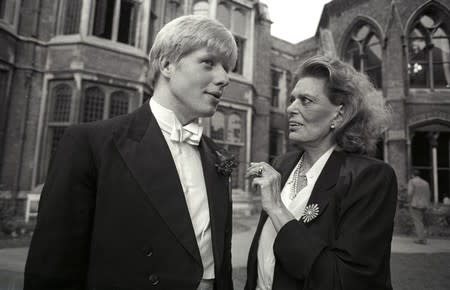 FILE PHOTO: Greek minister for culture Melina Mercouri speaks with President of the Oxford Union society Boris Johnson before she addressed the Union on the subject of the Elgin Marbles at the University of Oxford