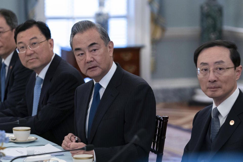 Chinese Foreign Minister Wang Yi, center, during a bilateral meeting with Secretary of State Antony Blinken at the State Department in Washington, Friday, Oct. 27, 2023. (AP Photo/Jose Luis Magana)