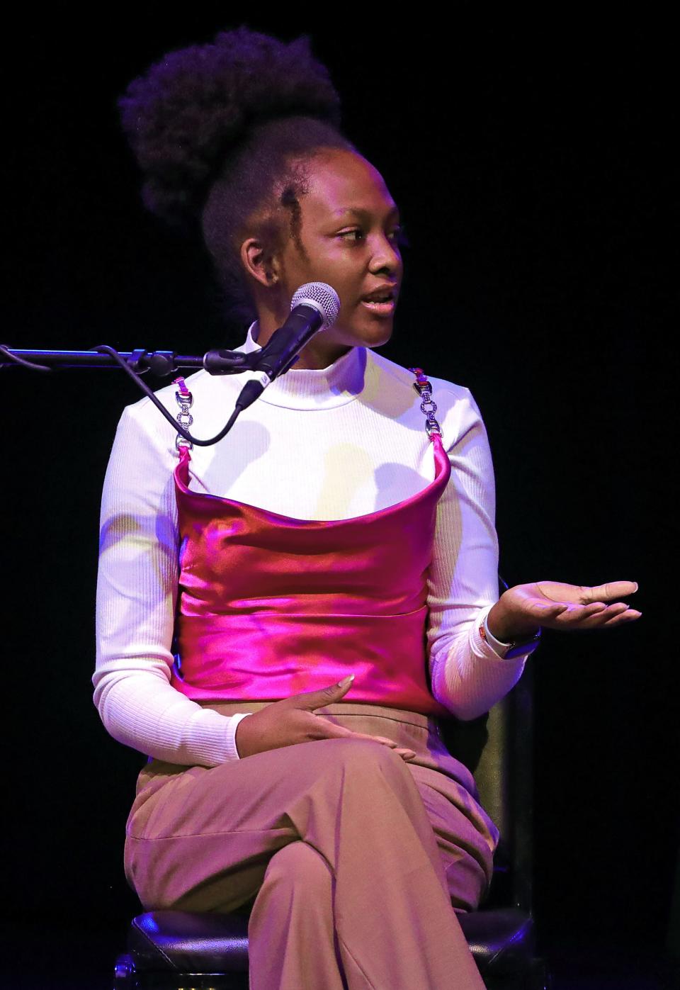 Youth activist Lauren Goggins speaks during the Justice for Jayland Symposium.