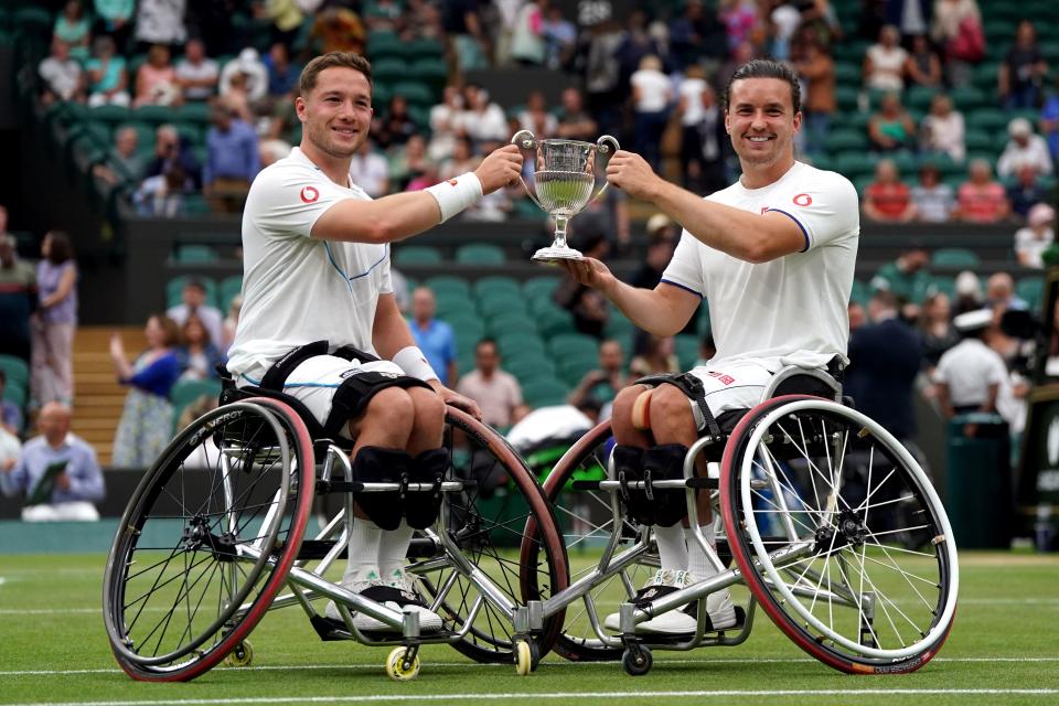 Alfie Hewett and Gordon Reid celebrate victory at Wimbledon (PA Wire)