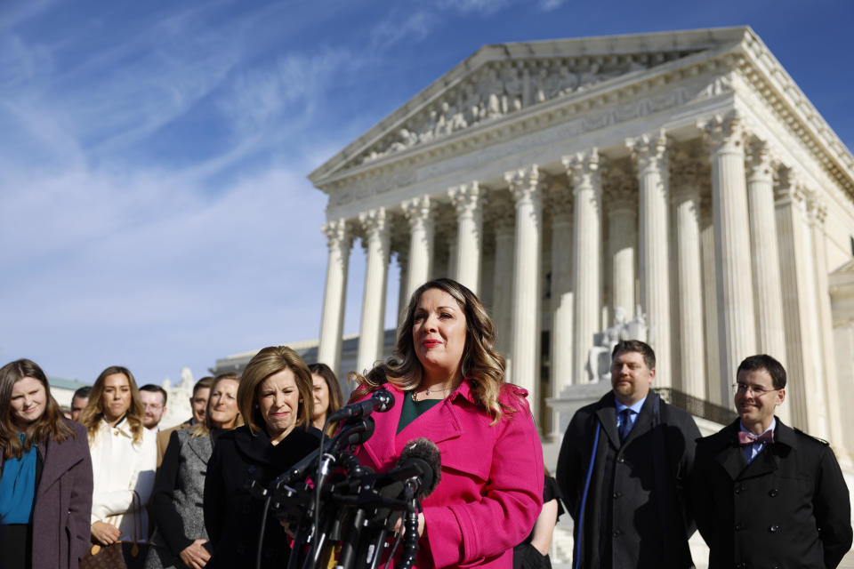 Lorie Smith, the owner of 303 Creative, a website design company in Colorado, speaks to reporters outside of the U.S. Supreme Court Building on Dec. 5, 2022, after the justices heard oral arguments in her case. / Credit: / Getty Images