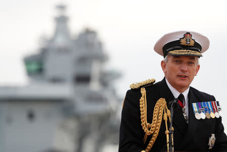 First Sea Lord Admiral Sir Philip Jones speaks after the arrival of the Royal Navy's new aircraft carrier HMS Queen Elizabeth in Portsmouth, Britain August 16, 2017. REUTERS/Peter Nicholls