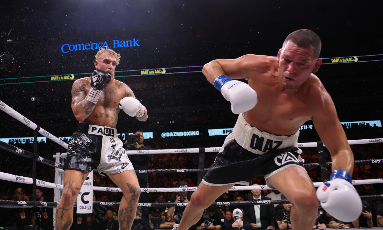 Jake Paul (left) knocks down Nate Diaz during a boxing match at American Airlines Center in Dallas on Aug 5, 2023. (Kevin Jairaj-USA TODAY Sports)