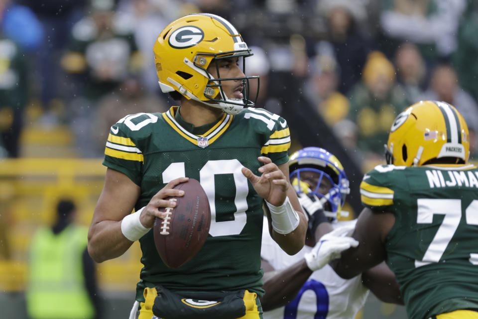 Green Bay Packers quarterback Jordan Love (10) looks to pass during the first half of an NFL football game against the Los Angeles Rams, Sunday, Nov. 5, 2023, in Green Bay, Wis. (AP Photo/Mike Roemer)